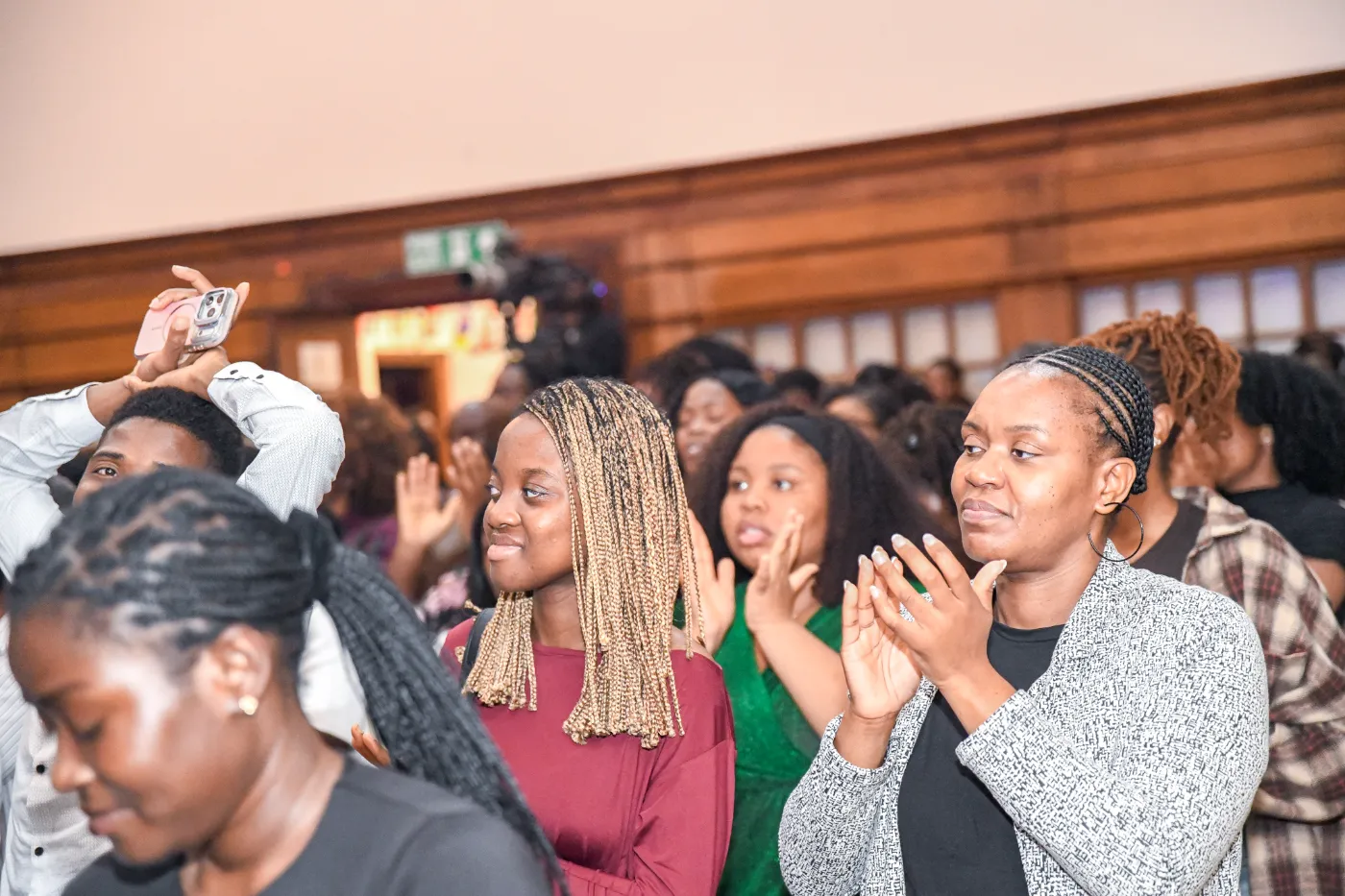 Guests applauding at the end of the Fireside Chat